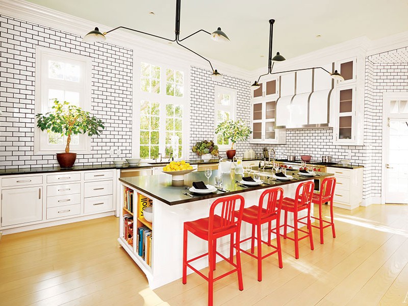 Use red items to make the kitchen interesting.