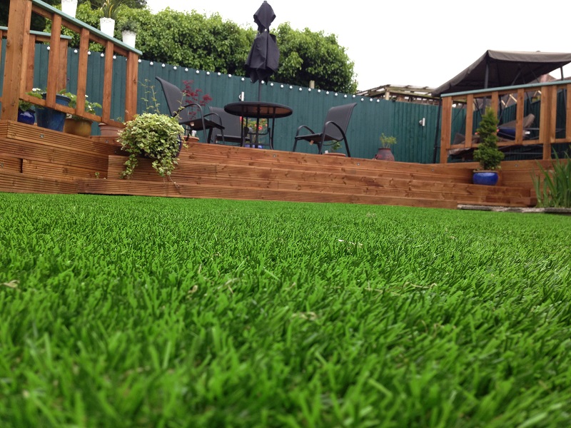 using synthetic grass for the garden.